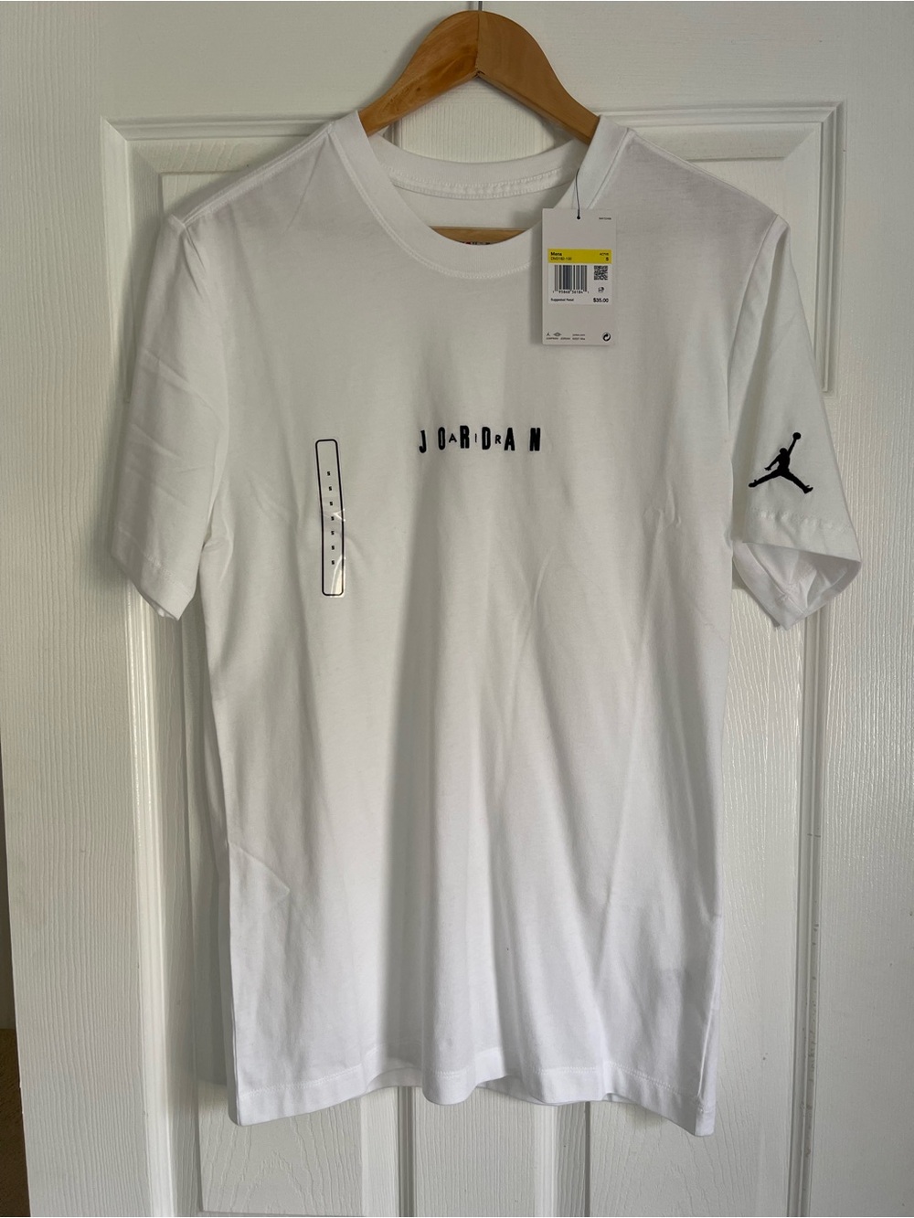 Jordan White Short Sleeve Tee with Black Jumpman Sleeve Logo